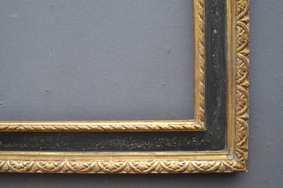 null Cassetta frame in moulded wood, blackened and gilded 

Italian style, 20th century

47,5...