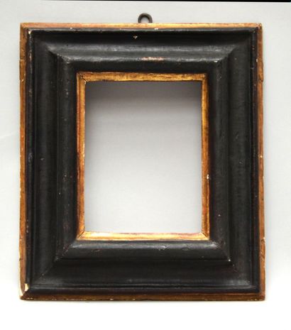 null A small blackened moulded wood frame with gilded edges.

Spain, 17th - 18th...