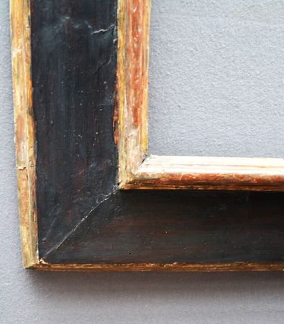 null A blackened and silvered wood frame with an upside down profile (minor wear...
