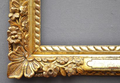 null Wooden frame, carved and gilded in the mecca style, decorated with flowering...