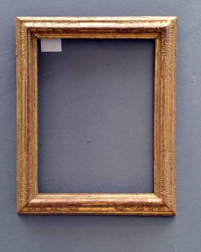null A carved and gilded wood frame with acanthus leaves and foliage in the corners

Provence,...