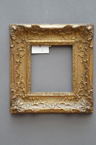 null A small gilded wood and stucco frame with Bérain decoration.

England, 18th...