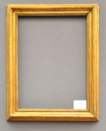 null Molded and gilded wooden frame decorated with a frieze of pearls (modified in...