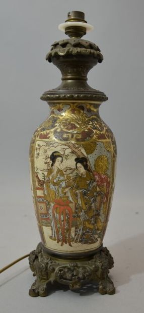 null JAPAN - Satsuma

Polychrome earthenware baluster vase decorated with characters...