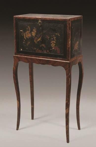 null Coromandel lacquer box decorated with branching birds and mounted on four cambered...