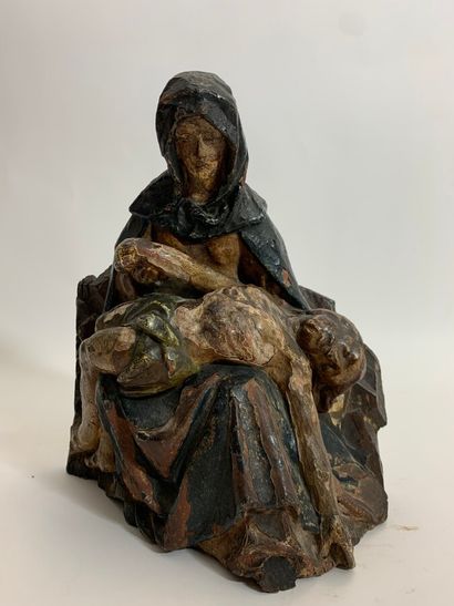 null PIETA en bois sculpté polychrome

XVIII ème siècle. 

Haut : 27 cm
