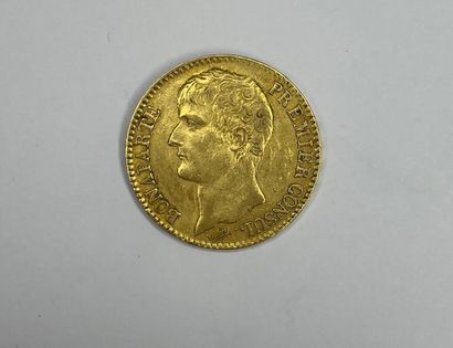 null Pièce de 40 francs Napoléon en or jaune (900/1000e) datée de l'An 12.

Poids...