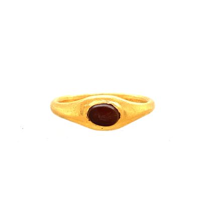 null BAGUE en or jaune (750/1000e) sertie d'une intaille ovale de jaspe rouge gravée...