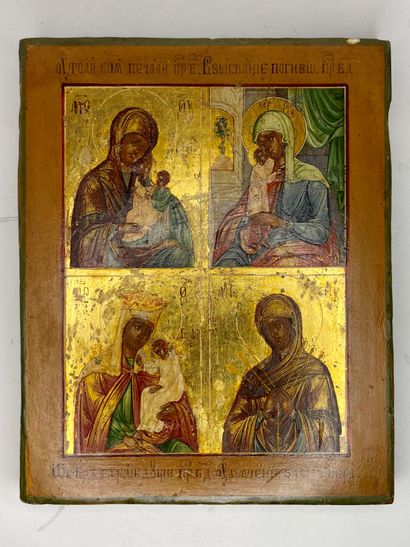 null ICONE en bois peint et doré à décor quadripartite de la vie de la Vierge.

Travail...
