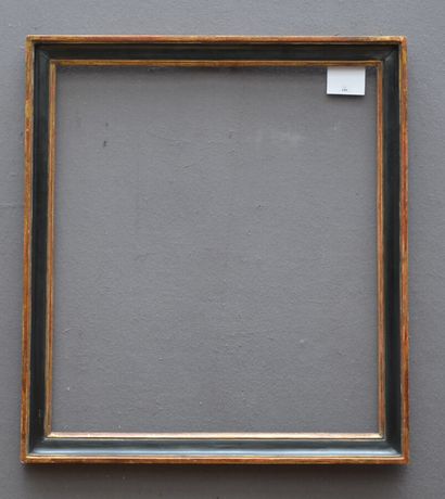 null BAGUETTE en bois mouluré noirci et doré 

Style Louis XVI, XIX ème 

59,5 x...