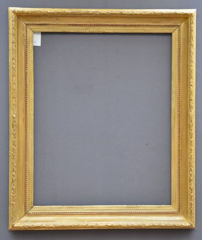 null Wood and gilded paste frame decorated with laurel leaves and pearls

Louis XVI...