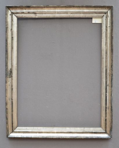 null BAGUETTE en bois mouluré et argenté

XIXième siècle

76 x 59,5 x 7,5 cm