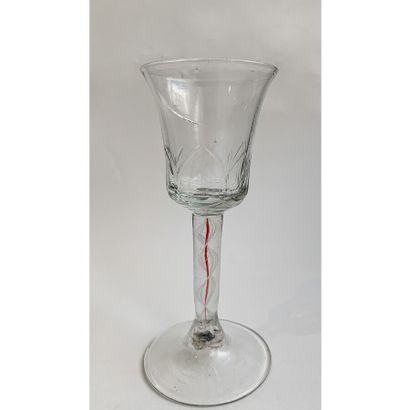 Wine glass in blown glass, the foot with...