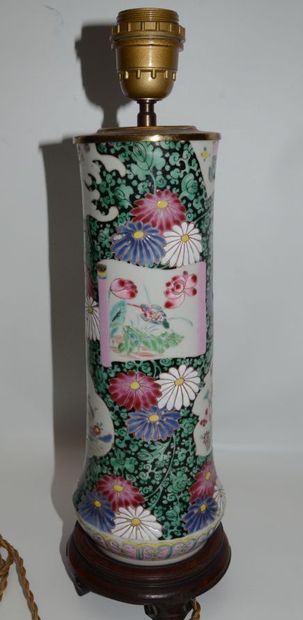 null CHINA

Porcelain bottle with polychrome decoration of flowers on black background....