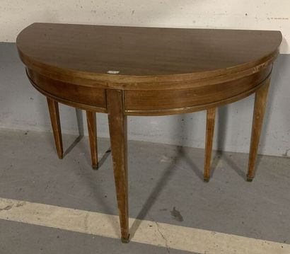 null Mahogany and gilded brass veneered half-moon table, resting on five legs with...