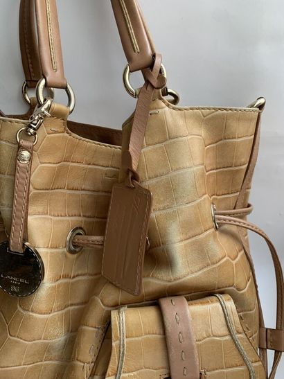 null LANCEL - Bucket bag model "Premier Flirt" in beige leather crocodile style.

Removable...