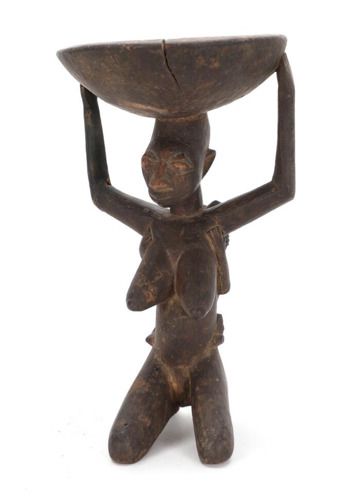 null Agere Ifa figurant une mère et son enfant

Yoruba, Nigéria

Bois

H. 34 cm

Un...