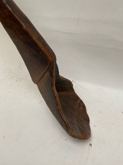 null Large wooden spoon with a beautiful brown and shiny patina, with notches on...