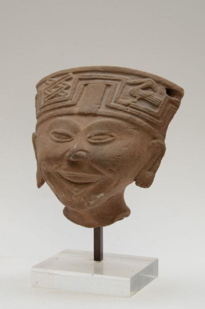 null Head of "Smiling" wearing a beautiful headdress decorated with the glyph of...