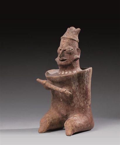 SEATED WARRIOR

Terracotta with red and cream...