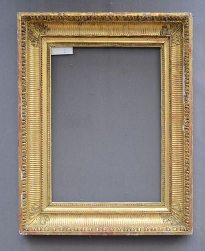null Wooden frame and gilded stucco with acanthus leaf channels in the corners.

19th...
