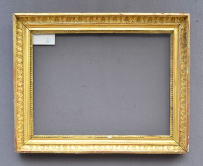 null Wood and gilded paste frame, decorated with a frieze of rais-de-coeur and palmettes.

Empire...