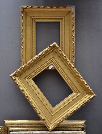 null Pair of gilded wooden FRAMES with a large sandblasted aplat and a main frieze...