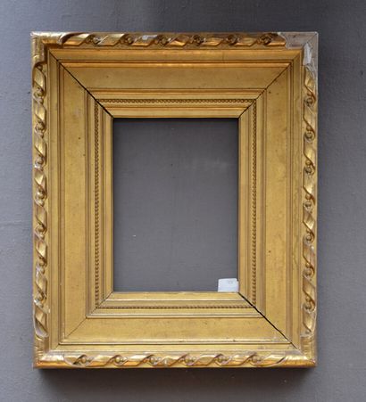 null Pair of gilded wooden FRAMES with a large sandblasted aplat and a main frieze...