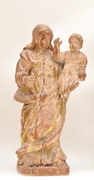 Vierge à l'enfant en bois sculpte partiellement...