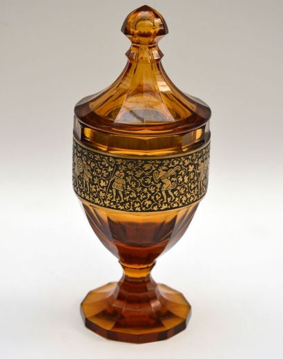 null MOSER in Karlsbad 
Cup with foot covered out of amber glass, the body with cut...