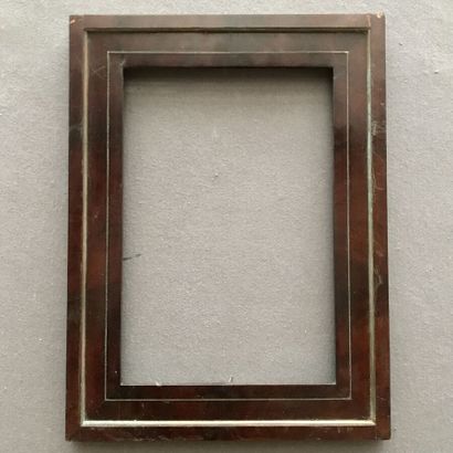 null PAIR OF FRAMES 
in mahogany veneer and copper net,
19th century,
34 x 23 cm...
