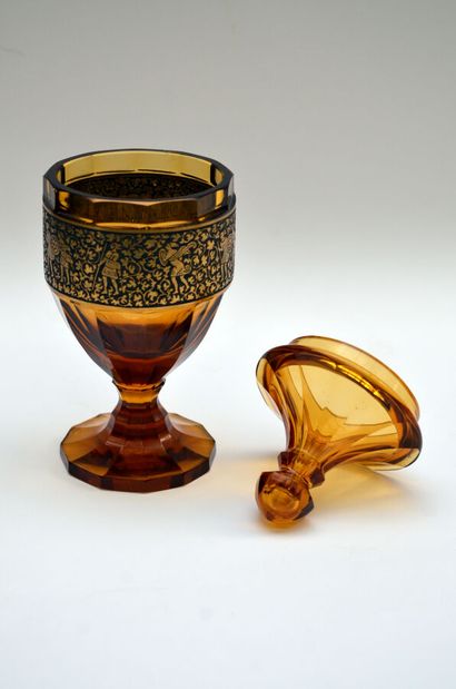 null MOSER in Karlsbad 
Cup with foot covered out of amber glass, the body with cut...