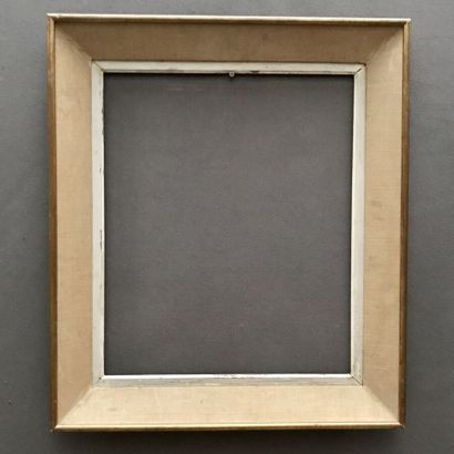 null Framed in carved wood and fabric,
64 x 53 cm.