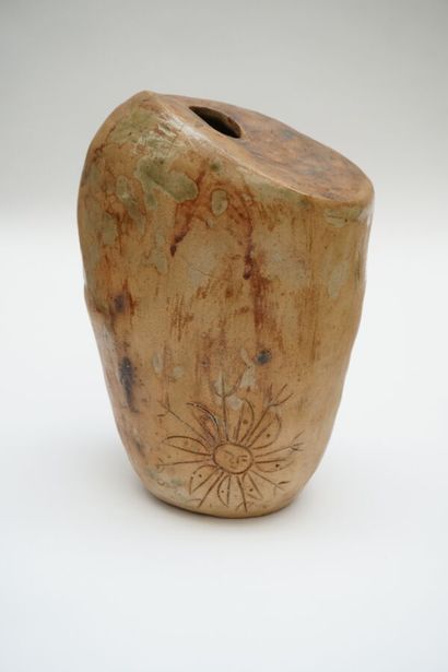 null VASE in stoneware of free form ochre and partially enamelled green with engraved...