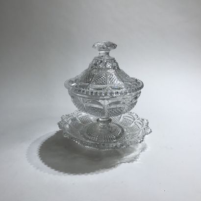 null Glass vase with twisted body and scalloped neck, decorated with metallic inclusions...