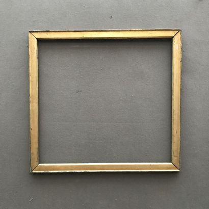null Lot of three FRAMES including : 

- A carved and gilded wood baguette frame,
54,5...