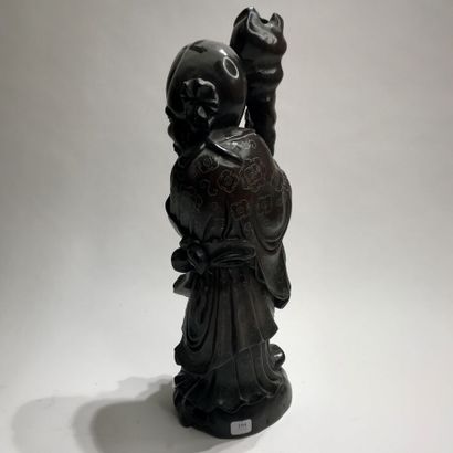 null STATUTE 
in carved exotic wood and silver inlay representing the god Shoulao...