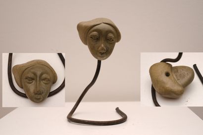 J.R. LARAT

Head of a woman 

Stone sculpture,...