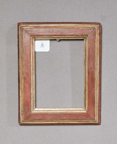 null Frame in molded wood lacquered brown and silver.
Italy.
18th century.
Dimensions...
