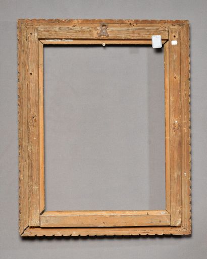 null Frame in molded wood, carved and gilded with frieze of water leaves, acanthus...