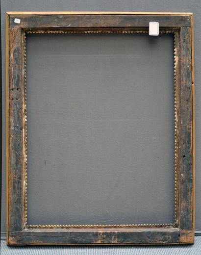 null FRAME 
in molded, carved, blackened and gilded wood, decorated with frieze of...