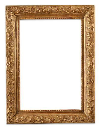 null FRAME 
in molded wood, carved and gilded, with frieze of pearls and bead decoration.
South...