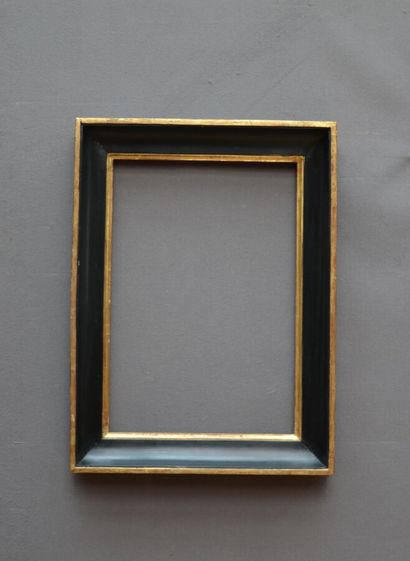 null FRAME
 in molded wood, blackened and gilded.
18th century.
Dimensions : 53,5...
