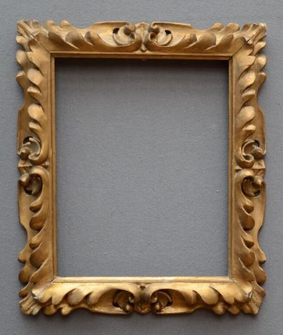 null FRAME 
with reversed profile in gilded wood, carved with openwork decoration...