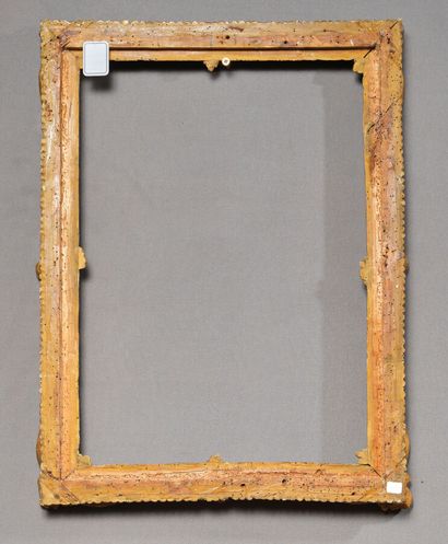 null Gilded wood frame richly carved with asymmetrical foliage scrolls with median...