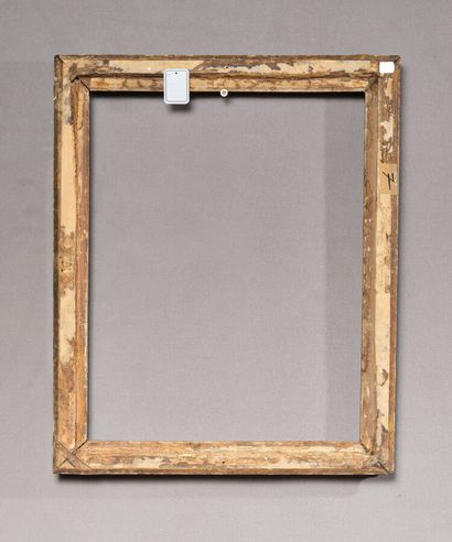 null Gilded molded wood frame carved with fine flowers and plumes in the corners.
Louis...