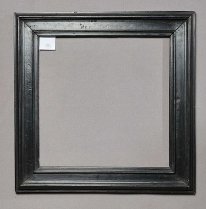 null FRAME 
Cassetta in molded wood and blackened formerly gilded. 
Italy.
17th century.
Dimensions...