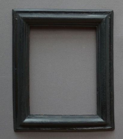 null FRAME 
with reversed profile in molded and blackened wood, formerly gilded.
18th...