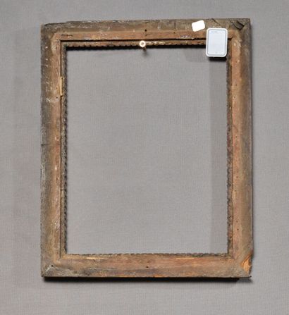 null Frame in patinated oak decorated with frieze of watered gadroons and frieze...