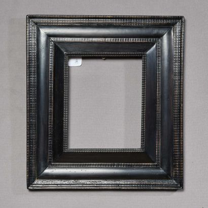 Frame with reversed profile in molded and...